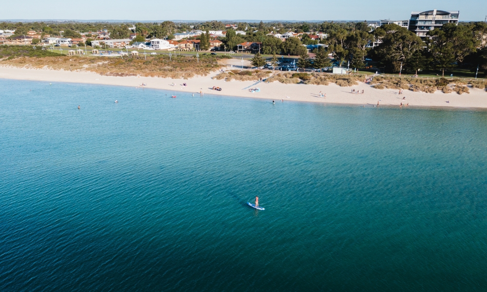 Stand up paddle boarding at Rockingham Beach.