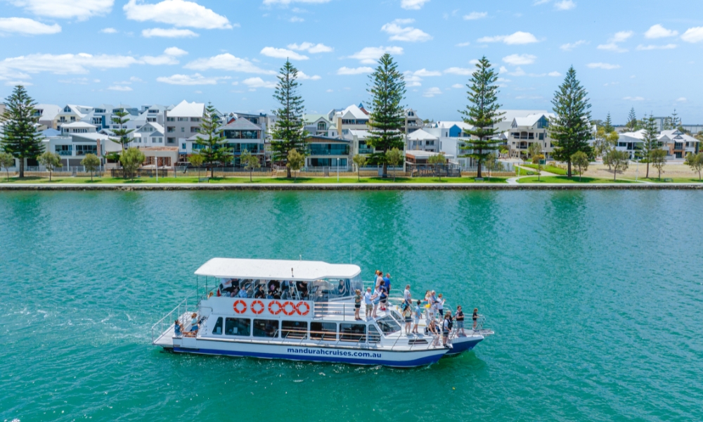 Set sail through Mandurah’s scenic playground on a Dolphin Cruise & Views Tour.